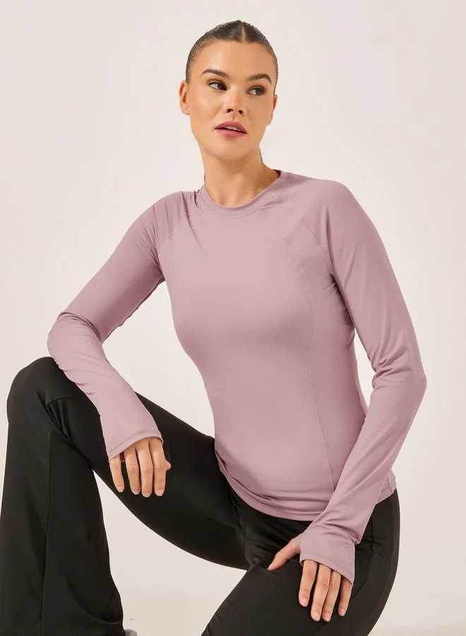 ستايلي اكتيف بلوزة بأكمام طويلة وفتحات للإبهام بتفاصيل خياطة